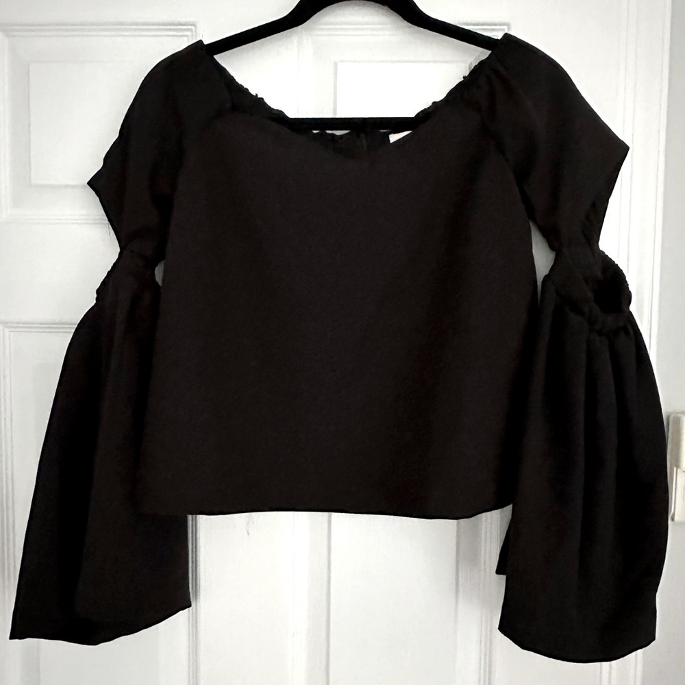 Renamed off shoulder top with cutout on arm